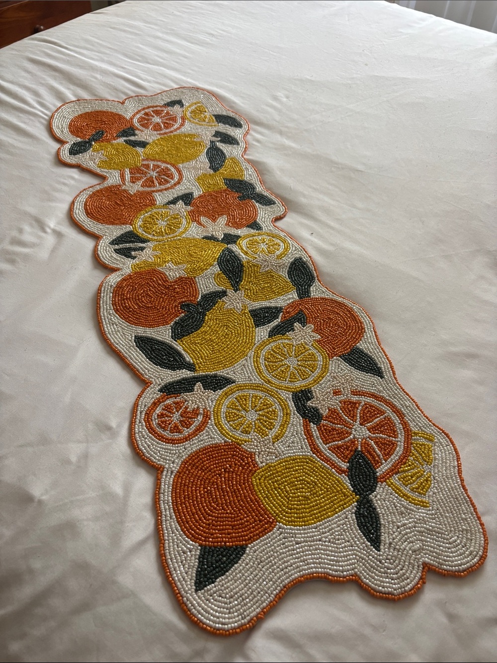 Ashland White Beaded Table Runner with Orange Trim